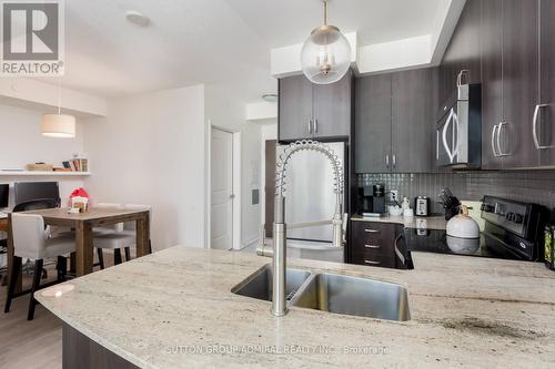 326 - 7608 Yonge Street, Vaughan, ON - Indoor Photo Showing Kitchen With Double Sink With Upgraded Kitchen