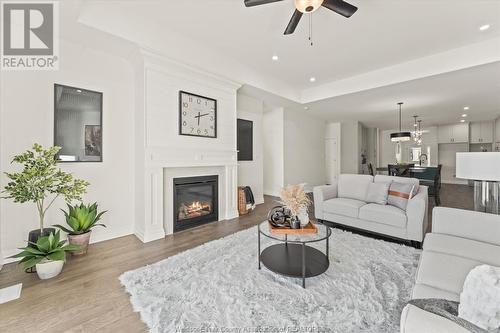 3198 Tullio Drive, Lasalle, ON - Indoor Photo Showing Living Room With Fireplace