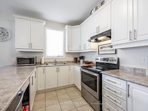 64 Pedwell St, Clarington, ON - Indoor Photo Showing Kitchen With Double Sink