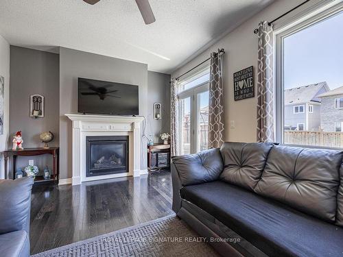 64 Pedwell St, Clarington, ON - Indoor Photo Showing Living Room With Fireplace