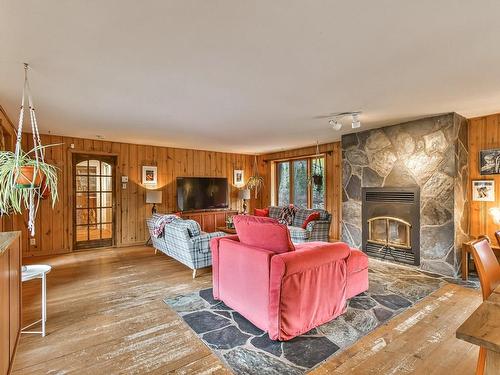 Living room - 750 Ch. Des Hauteurs, Sainte-Marguerite-Du-Lac-Masson, QC - Indoor Photo Showing Living Room With Fireplace