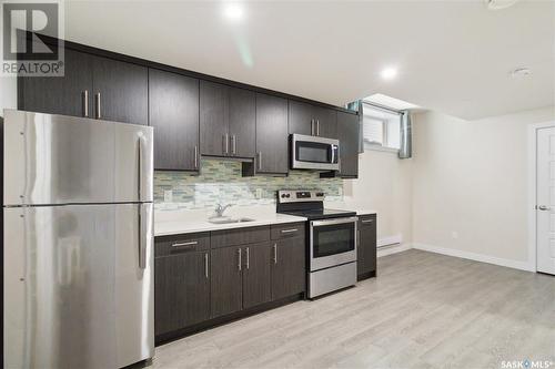 119 Marlatte Crescent, Saskatoon, SK - Indoor Photo Showing Kitchen With Stainless Steel Kitchen With Double Sink