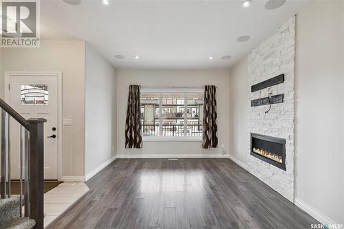 119 Marlatte Crescent, Saskatoon, SK - Indoor Photo Showing Living Room With Fireplace
