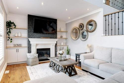 79 Kaufman Drive, Binbrook, ON - Indoor Photo Showing Living Room With Fireplace