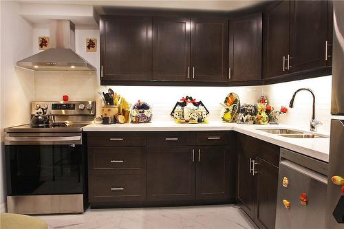 145 Hillcrest Avenue|Unit #209, Mississauga, ON - Indoor Photo Showing Kitchen With Double Sink