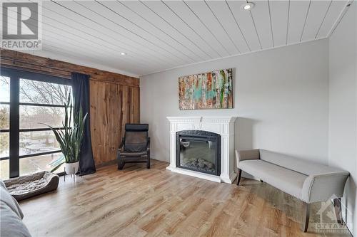 9261 33 Highway, Napanee, ON - Indoor Photo Showing Living Room With Fireplace