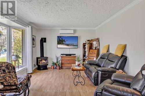 422 Marble Point Road, Marmora And Lake, ON - Indoor Photo Showing Living Room With Fireplace
