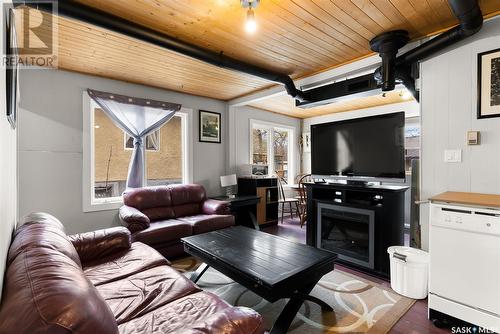 112 Green Avenue, Regina Beach, SK - Indoor Photo Showing Living Room With Fireplace