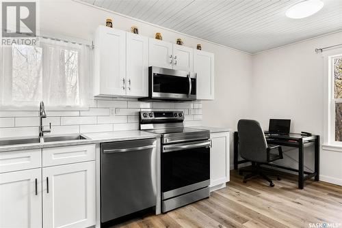 112 Green Avenue, Regina Beach, SK - Indoor Photo Showing Kitchen With Double Sink