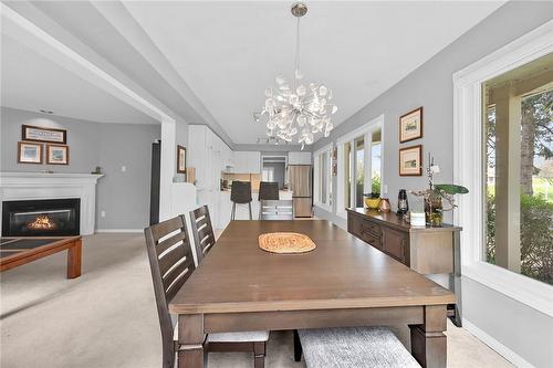 11 Pirie Drive|Unit #20, Dundas, ON - Indoor Photo Showing Dining Room With Fireplace