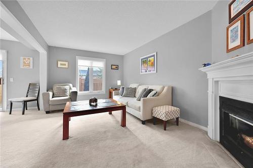 11 Pirie Drive|Unit #20, Dundas, ON - Indoor Photo Showing Living Room With Fireplace