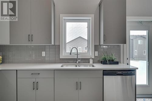3205 Green Turtle Road, Regina, SK - Indoor Photo Showing Kitchen With Double Sink