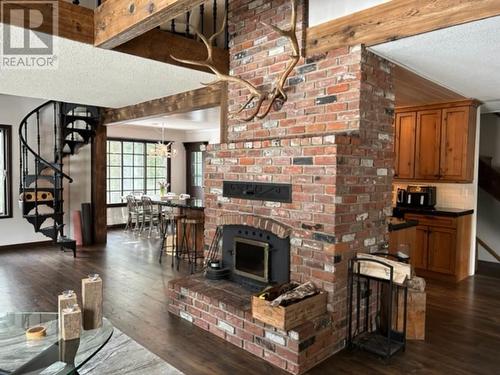 3025 Camozzi Road, Revelstoke, BC - Indoor Photo Showing Other Room With Fireplace