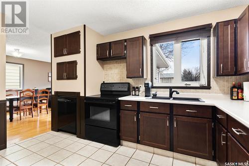 339 Trifunov Crescent, Regina, SK - Indoor Photo Showing Kitchen With Double Sink