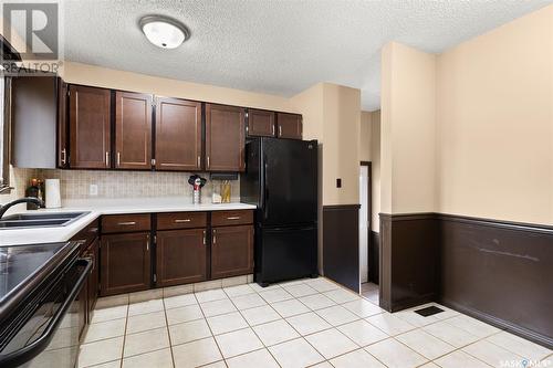 339 Trifunov Crescent, Regina, SK - Indoor Photo Showing Kitchen With Double Sink