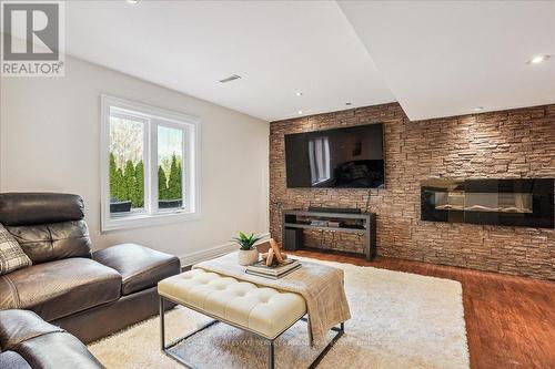 1360 Winterberry Drive, Burlington, ON - Indoor Photo Showing Living Room With Fireplace
