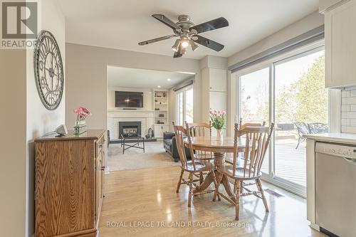 62 Comox Court, London, ON - Indoor Photo Showing Dining Room With Fireplace