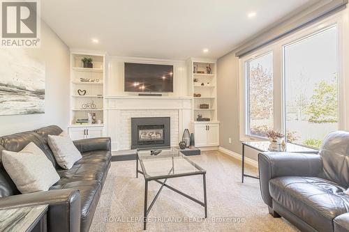 62 Comox Court, London, ON - Indoor Photo Showing Living Room With Fireplace