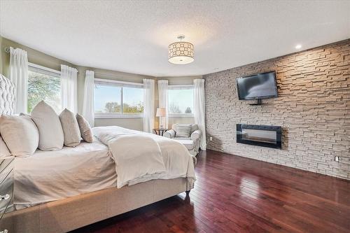 1360 Winterberry Drive, Burlington, ON - Indoor Photo Showing Bedroom With Fireplace