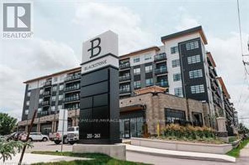 506 - 243 Northfield Drive E, Waterloo, ON - Outdoor With Balcony With Facade