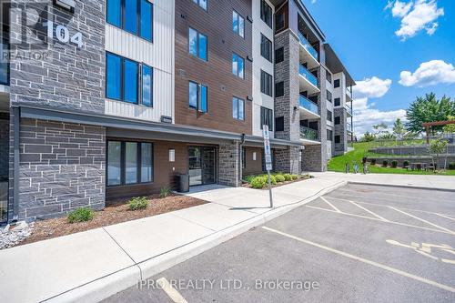 #211 - 104 Summit Ridge Drive, Guelph, ON - Outdoor With Facade