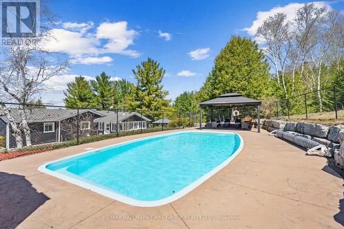 9607 Turk Road, Hamilton Township, ON - Outdoor With In Ground Pool With Backyard