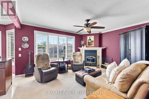 22 Sikorski Avenue, St. Catharines, ON - Indoor Photo Showing Living Room With Fireplace