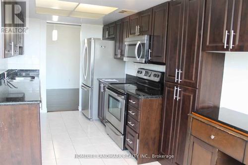 410 - 30 Thunder Grove, Toronto, ON - Indoor Photo Showing Kitchen