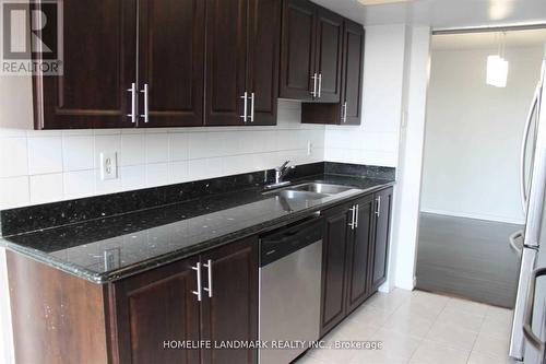 410 - 30 Thunder Grove, Toronto, ON - Indoor Photo Showing Kitchen With Double Sink