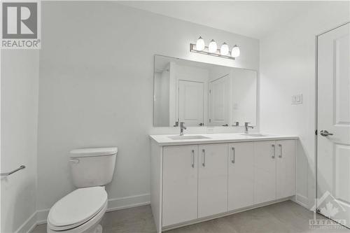 Main bathroom with double sink vanity - 316 Makobe Lane, Ottawa, ON - Indoor Photo Showing Bathroom