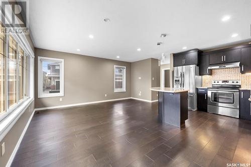 254 4002 Sandhill Crescent, Regina, SK - Indoor Photo Showing Kitchen With Stainless Steel Kitchen With Upgraded Kitchen