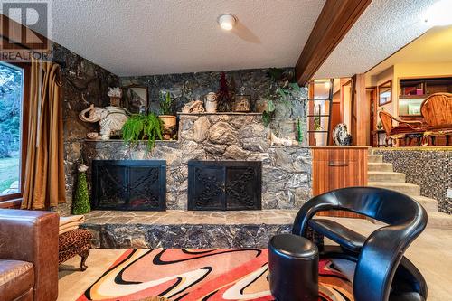 239 Stepping Stone Crescent, Spallumcheen, BC - Indoor With Fireplace