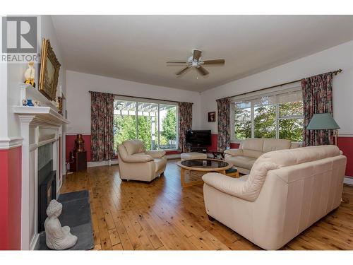 9739 Delcliffe Road, Vernon, BC - Indoor Photo Showing Living Room With Fireplace