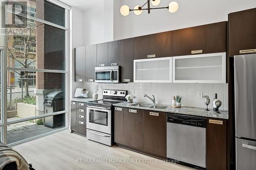 104 - 100 Western Battery Road, Toronto, ON - Indoor Photo Showing Kitchen With Double Sink