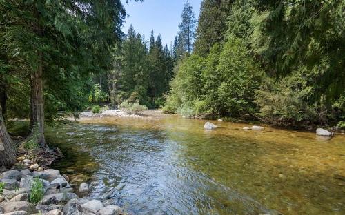 1590 Pass Creek Road, Castlegar, BC - Outdoor With Body Of Water With View