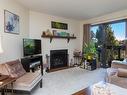 405-75 Gorge Rd West, Saanich, BC  - Indoor Photo Showing Living Room With Fireplace 