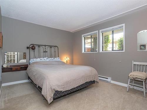 101-1252 Pandora Ave, Victoria, BC - Indoor Photo Showing Bedroom