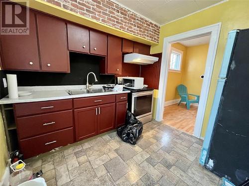 944 Mckay, Windsor, ON - Indoor Photo Showing Kitchen With Double Sink