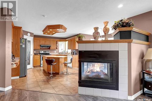 11195 Wascana Meadows, Regina, SK - Indoor With Fireplace