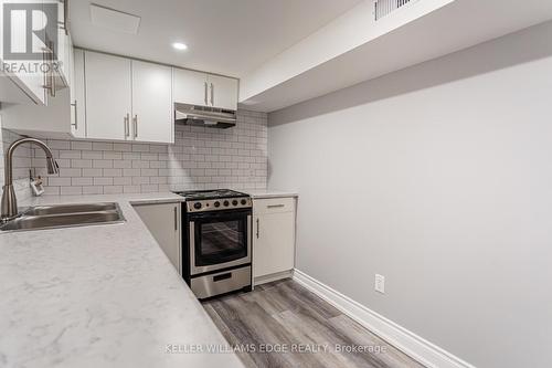 136 Gage Avenue S, Hamilton, ON - Indoor Photo Showing Kitchen With Double Sink