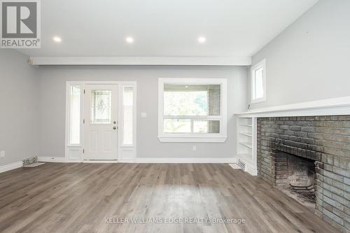 136 Gage Avenue S, Hamilton, ON - Indoor Photo Showing Other Room With Fireplace