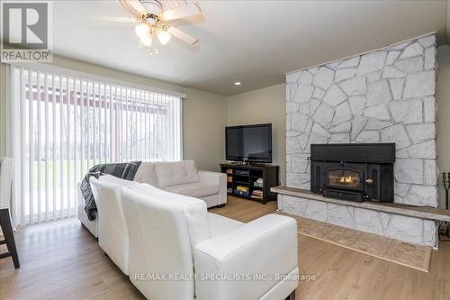 1 - 215 Edward Street, Clearview, ON - Indoor Photo Showing Living Room With Fireplace