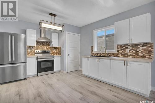 1412 20Th Street W, Saskatoon, SK - Indoor Photo Showing Kitchen With Stainless Steel Kitchen With Upgraded Kitchen