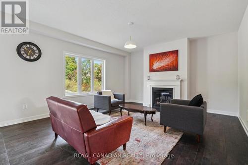 39 Tulip Crescent, Norfolk, ON - Indoor Photo Showing Living Room With Fireplace