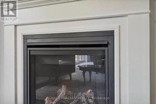 39 Tulip Crescent, Norfolk, ON - Indoor Photo Showing Living Room With Fireplace