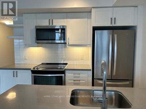 3303 - 50 Wellesley Street E, Toronto, ON - Indoor Photo Showing Kitchen With Stainless Steel Kitchen With Double Sink With Upgraded Kitchen