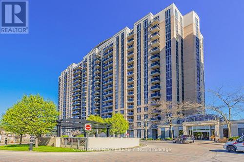 115 - 8 Mondeo Drive, Toronto, ON - Outdoor With Facade