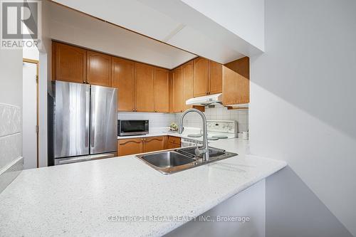 115 - 8 Mondeo Drive, Toronto, ON - Indoor Photo Showing Kitchen With Double Sink