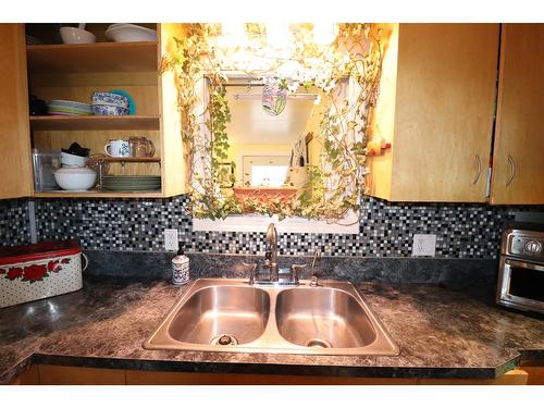 2036 Loff Road, Castlegar, BC - Indoor Photo Showing Kitchen With Double Sink