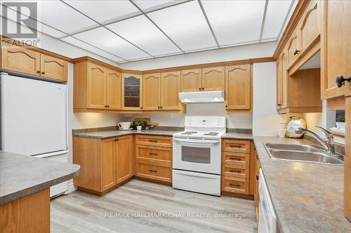 106 - 181 Collier Street, Barrie, ON - Indoor Photo Showing Kitchen With Double Sink